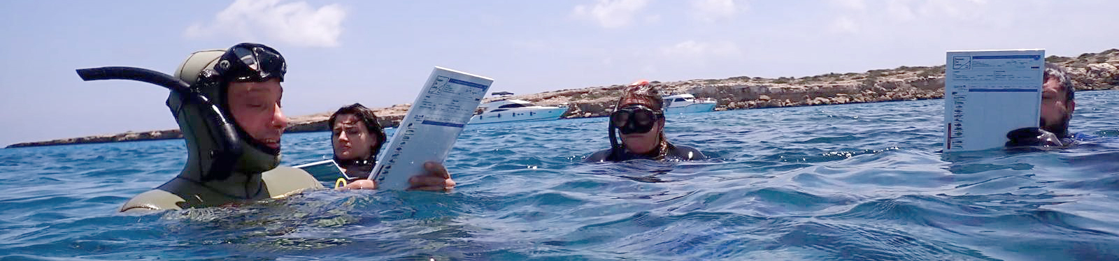 Divers during the training on the field at Cavo Greco MPA.